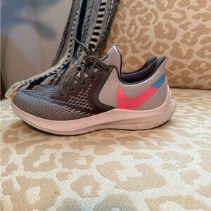 Nike Women's Gray Running Shoe with Pink and Blue Swoosh Accent